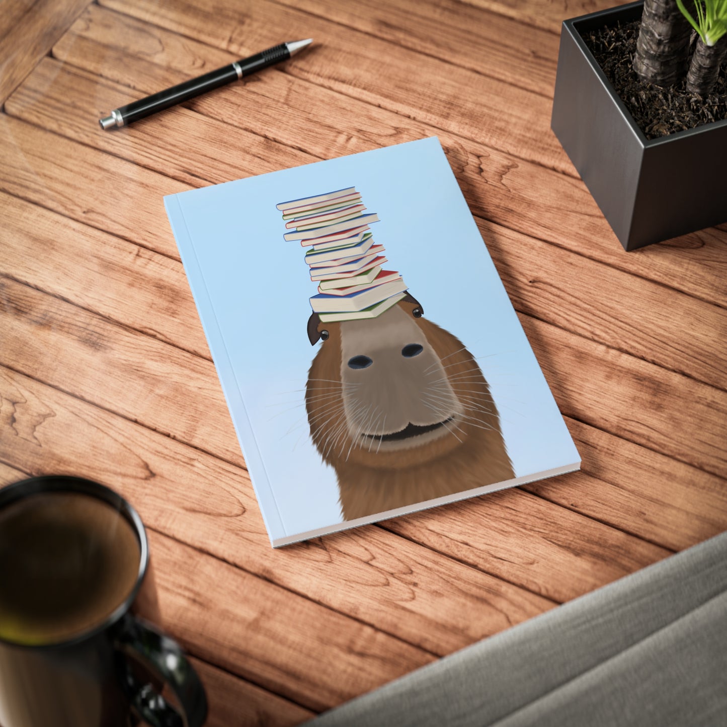 Capybara mit Büchern A5 Softcover Notizbuch 150 Seiten Liniert