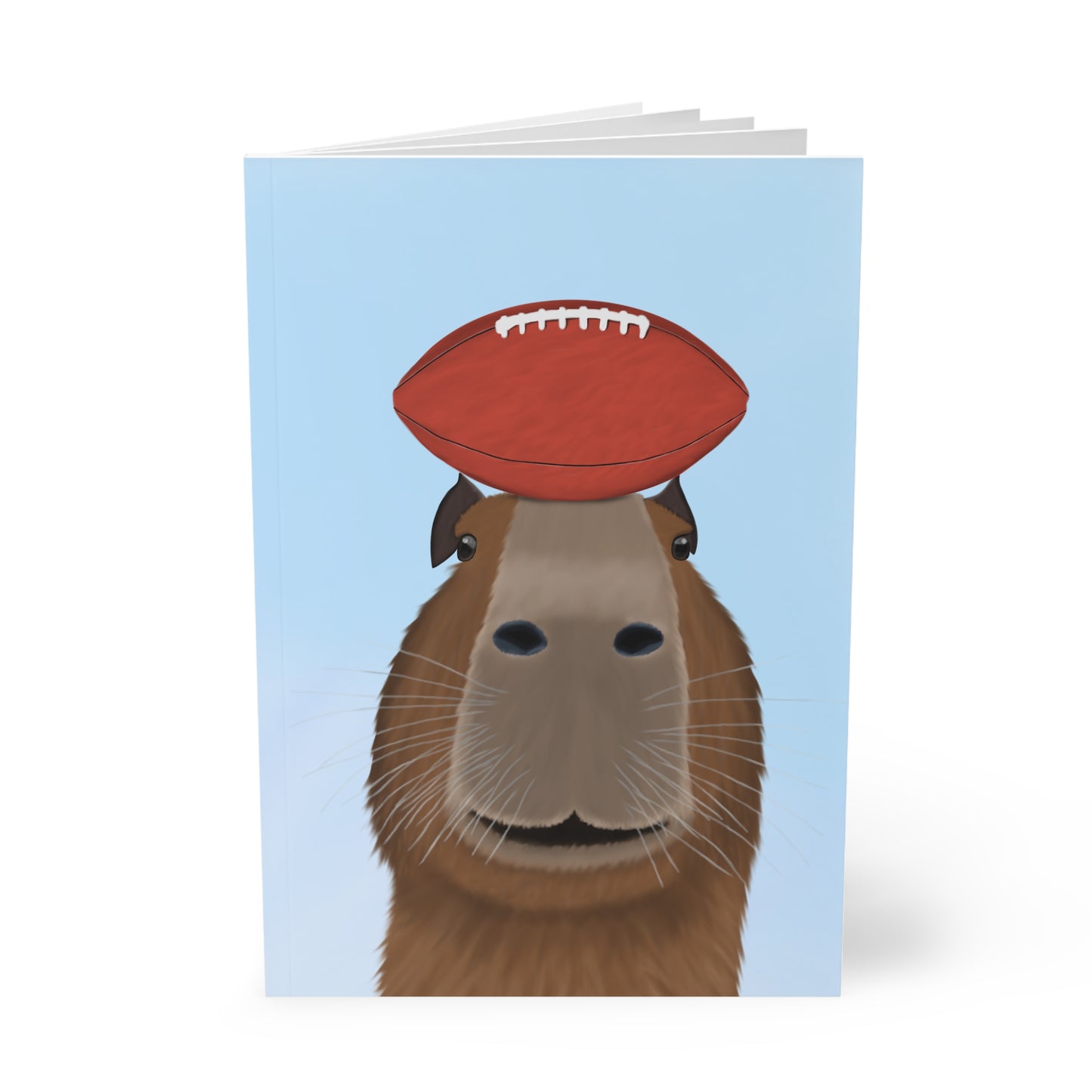 Capybara mit Football A5 Softcover Notizbuch 150 Seiten Liniert