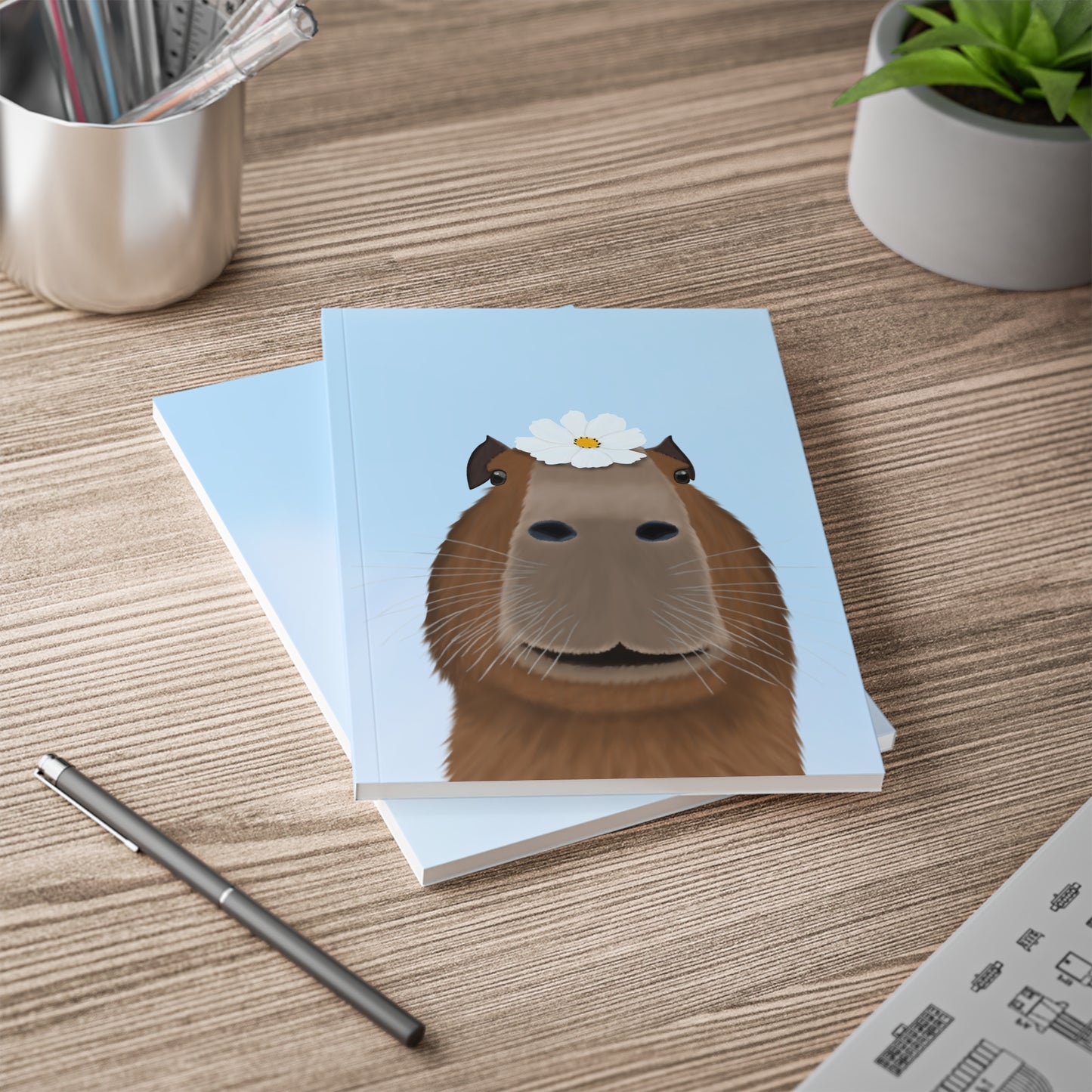 Capybara mit Blume A5 Softcover Notizbuch 150 Seiten Liniert