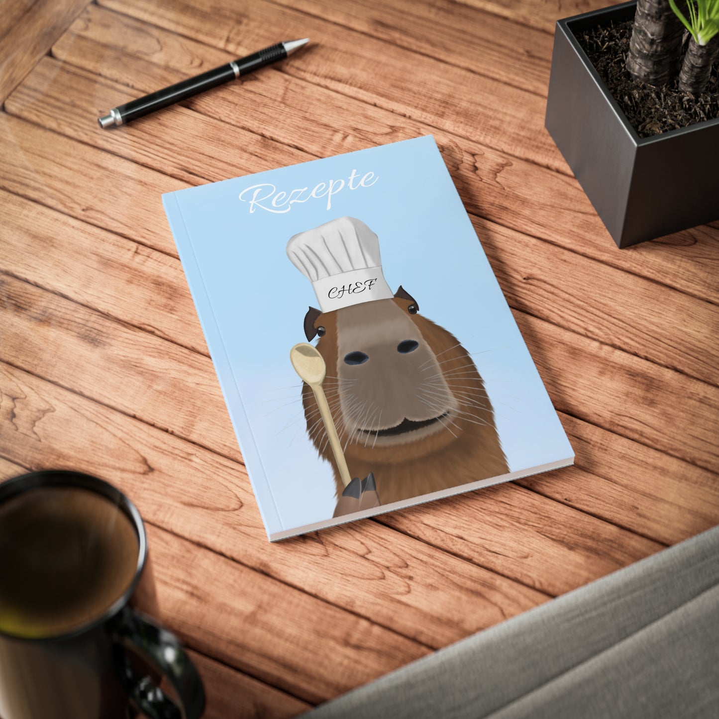 Capybara mit Kochmütze und Kochlöffel A5 Softcover Notizbuch 150 Seiten Liniert