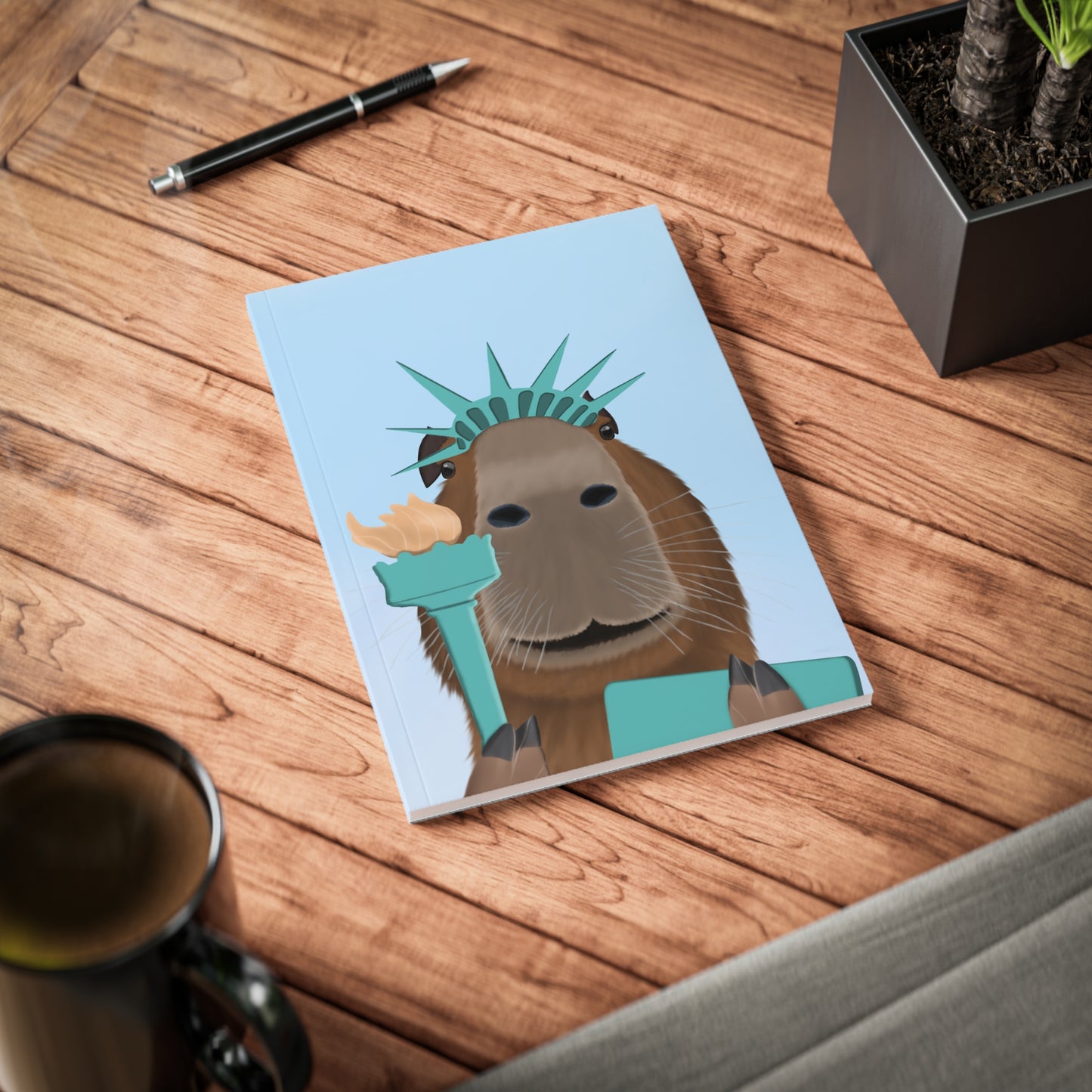 Capybara als Freiheitsstatue mit Krone, Fackel und Tafel A5 Softcover Notizbuch 150 Seiten Liniert