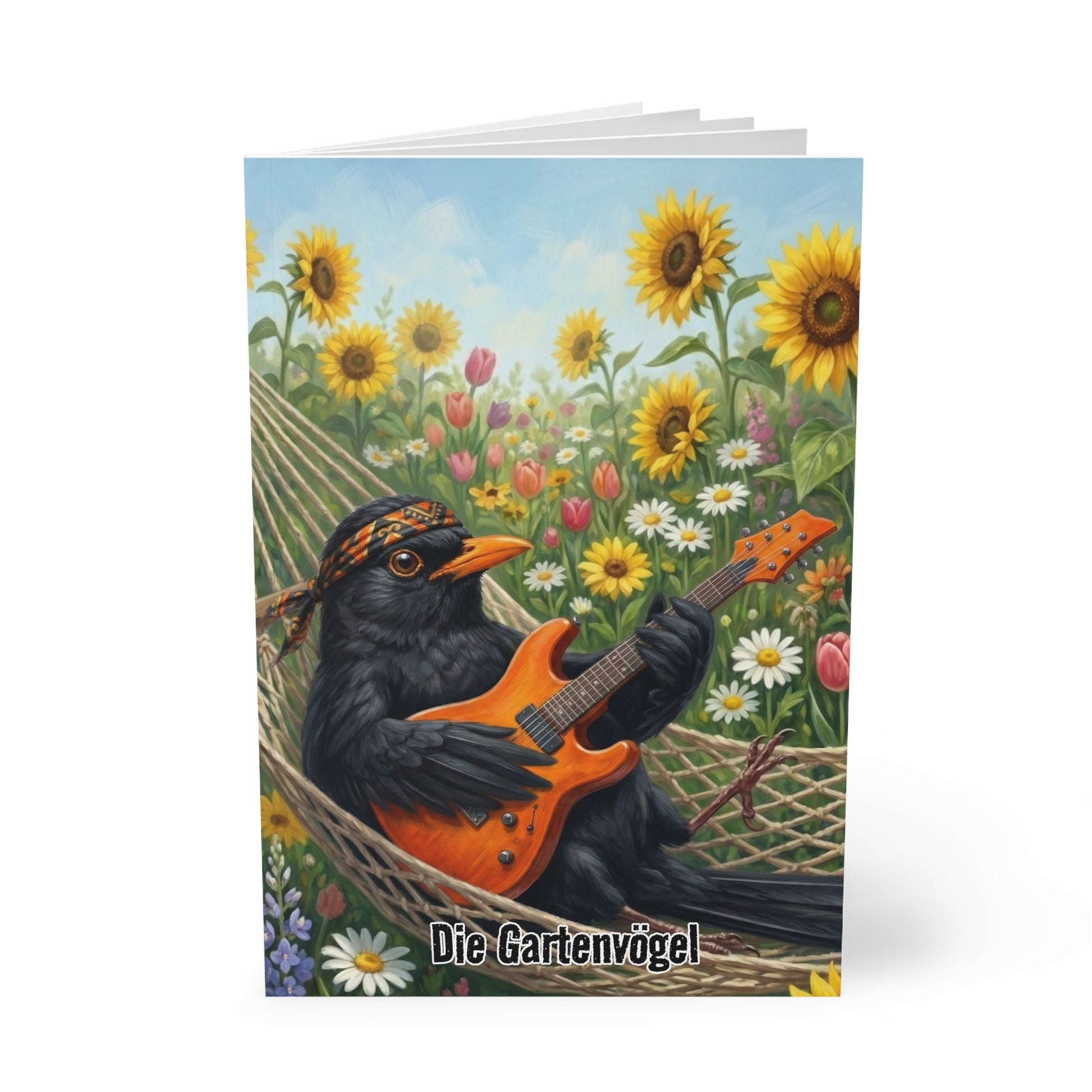 Blacky mit Gitarre Notizbücher – in der Hängematte - Premium Notizbuch A5 Vogelmotiv | Die Gartenvögel