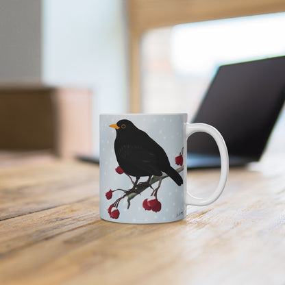 Amsel auf einem Ast im Winter Weihnachten Schnee Vogel Tasse