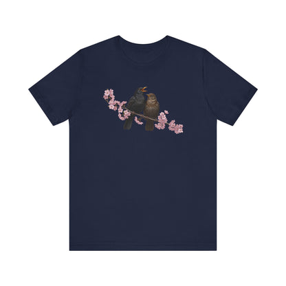 Navy blue t-shirt with a bird and cherry blossom design on a white background