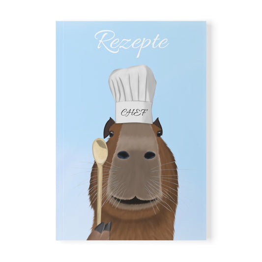 Capybara mit Kochmütze und Kochlöffel A5 Softcover Notizbuch 150 Seiten Liniert