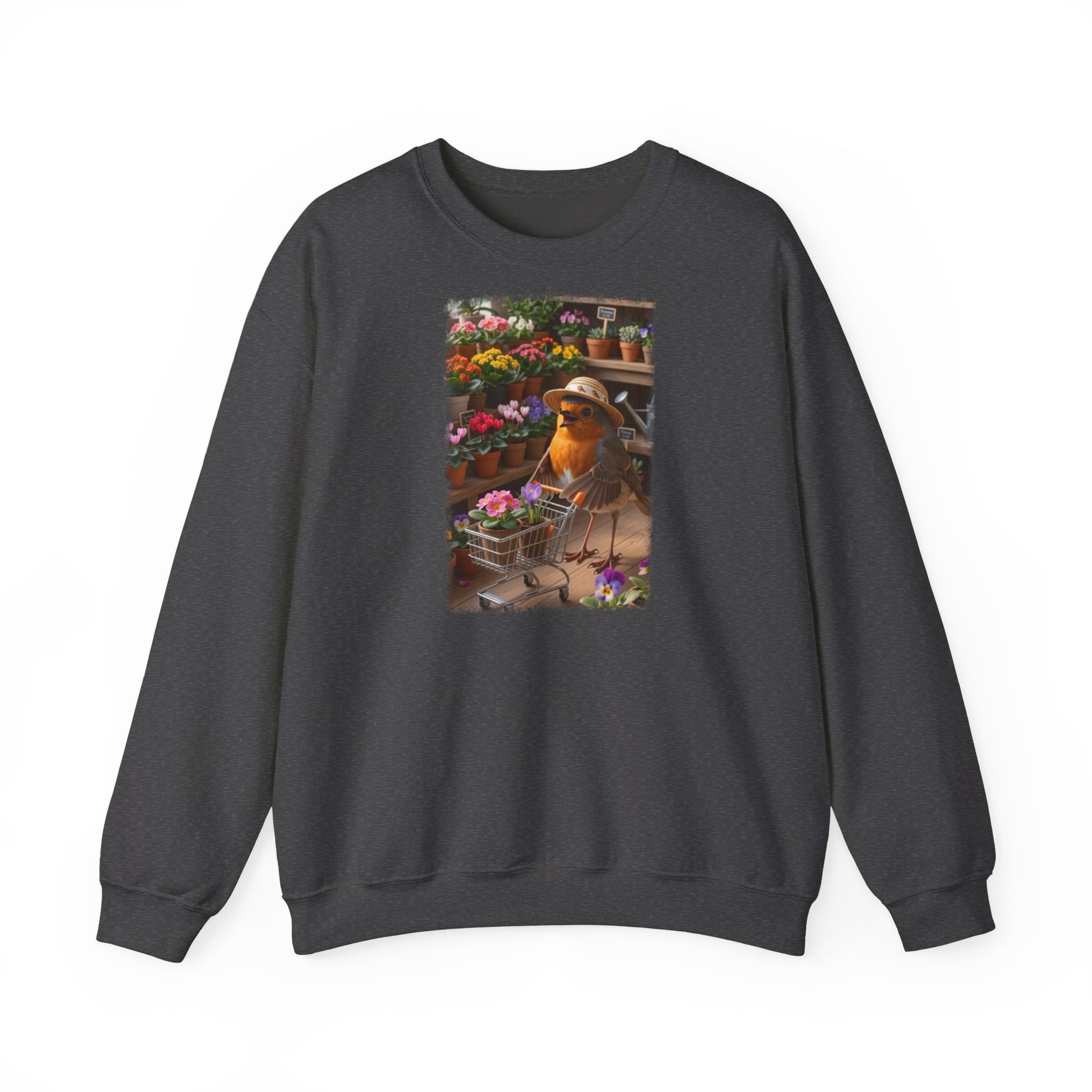 Digital gemalte Illustration eines glücklichen Rotkehlchens mit Sonnenhut, das an einer Blume schnuppert und einen vollen Einkaufswagen schiebt, gedruckt mit weichen Acryl-Kanten auf einem warmen Unisex-Sweatshirt.
