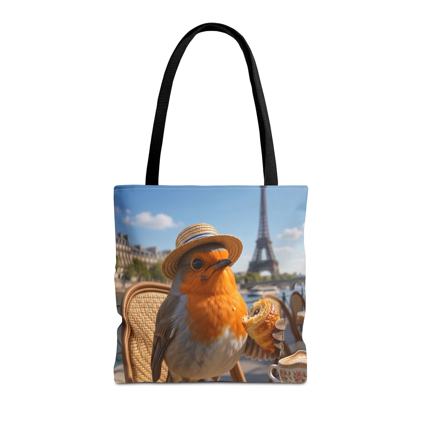 Robuste 40x40 cm Stofftasche mit einer digital gemalten Illustration von Rosi Rotkehlchen, das ein Croissant in einem Pariser Bistro vor dem Eiffelturm isst.